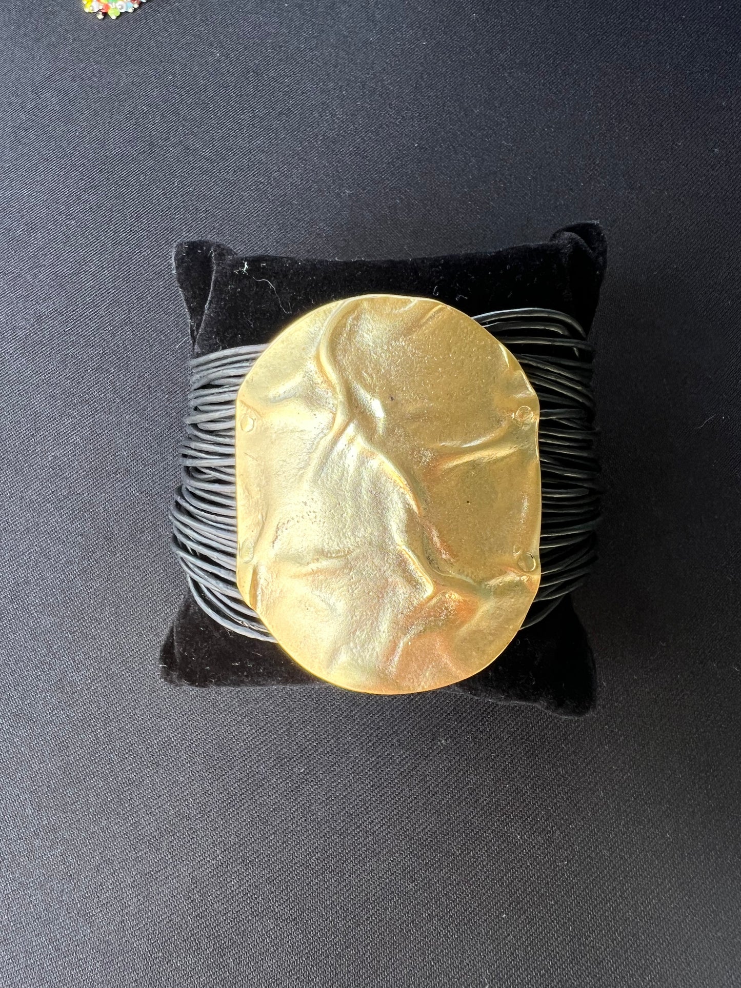 Leather strap round gold bracelet