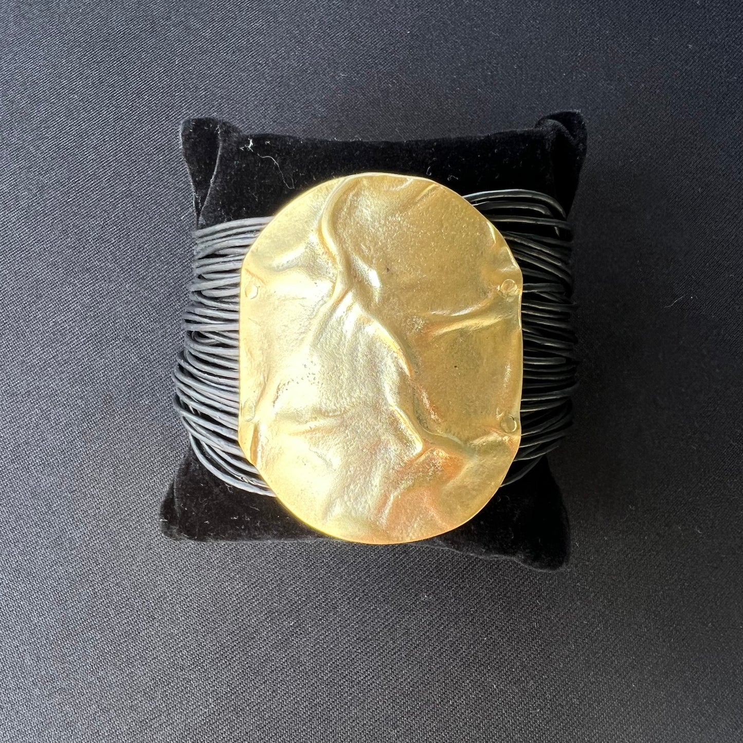 Leather strap round gold bracelet