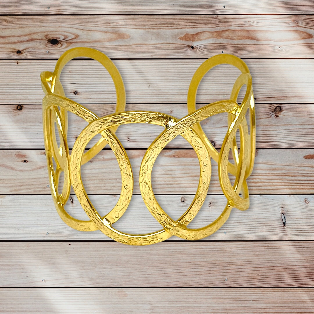 gold circular Bracelet