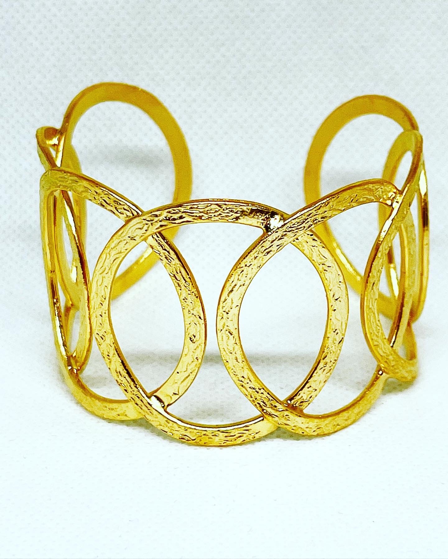 gold circular Bracelet