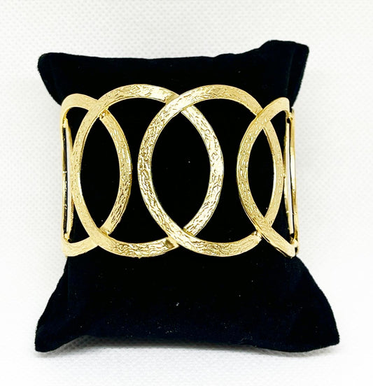 gold circular Bracelet