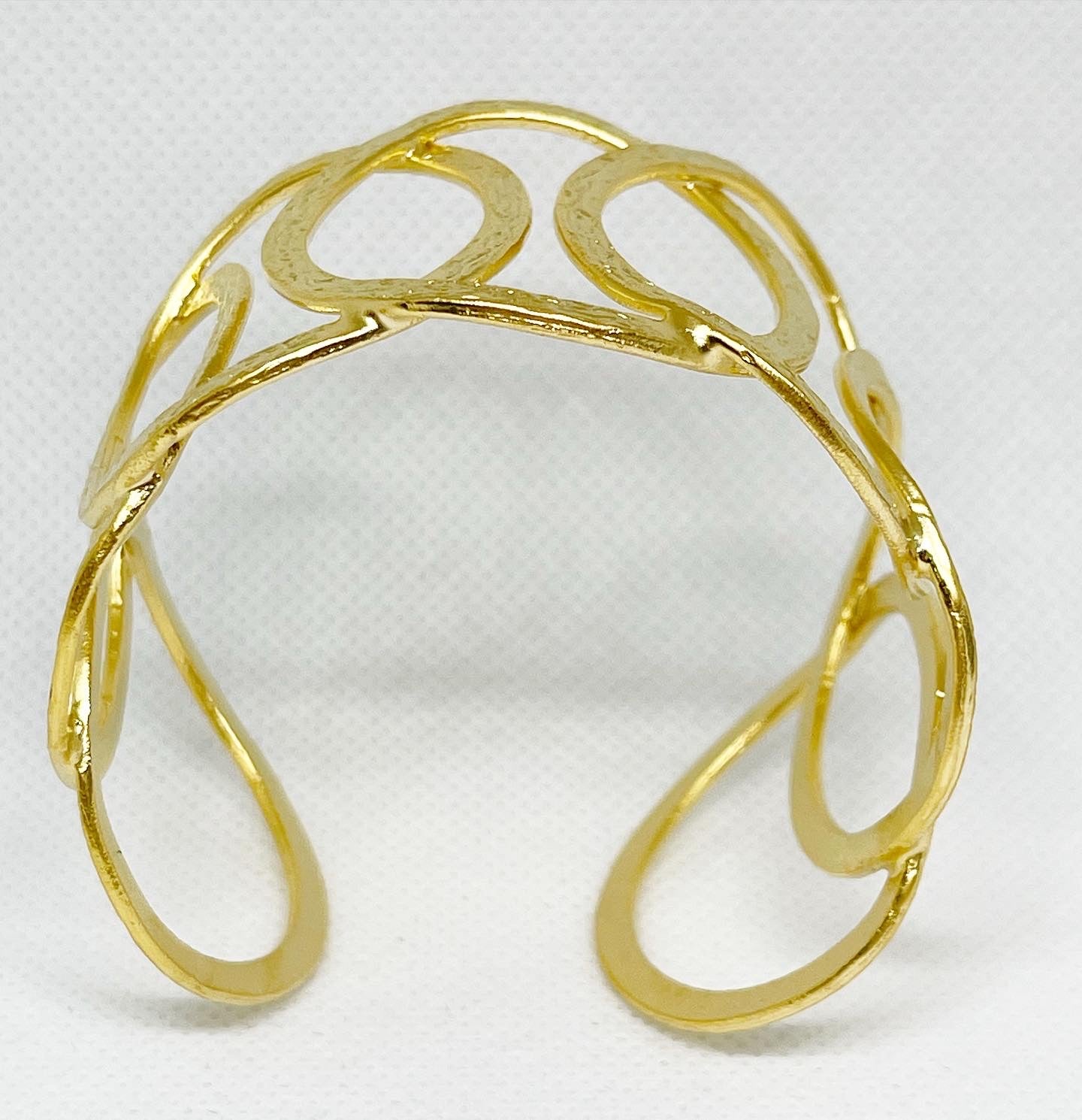 gold circular Bracelet